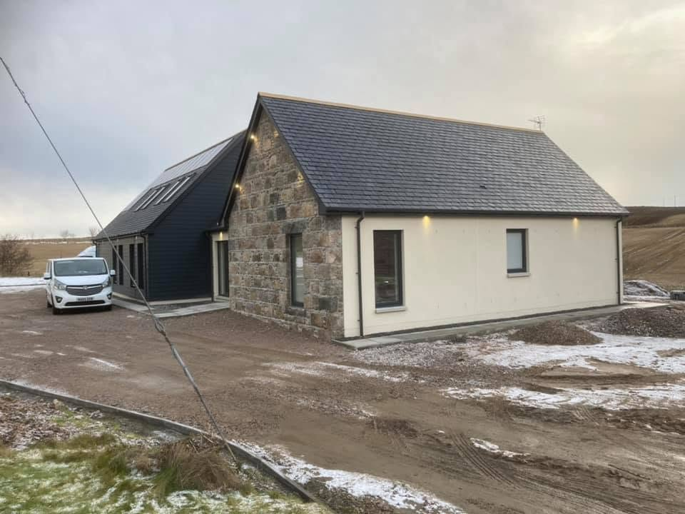 Completed new build house with granite and slate finishes in Aberdeenshire
